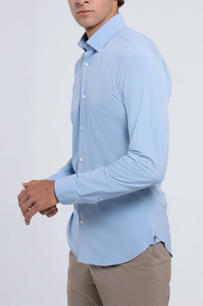 Side view of a man wearing state of matter sustainable men's long sleeve light blue shirt