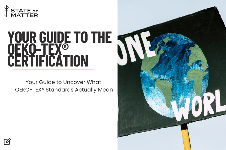 A promotional image for State of Matter's guide to OEKO-TEX® Certification, with a hand-painted sign showing the Earth and the words "ONE WORLD" to signify sustainable textile practices.