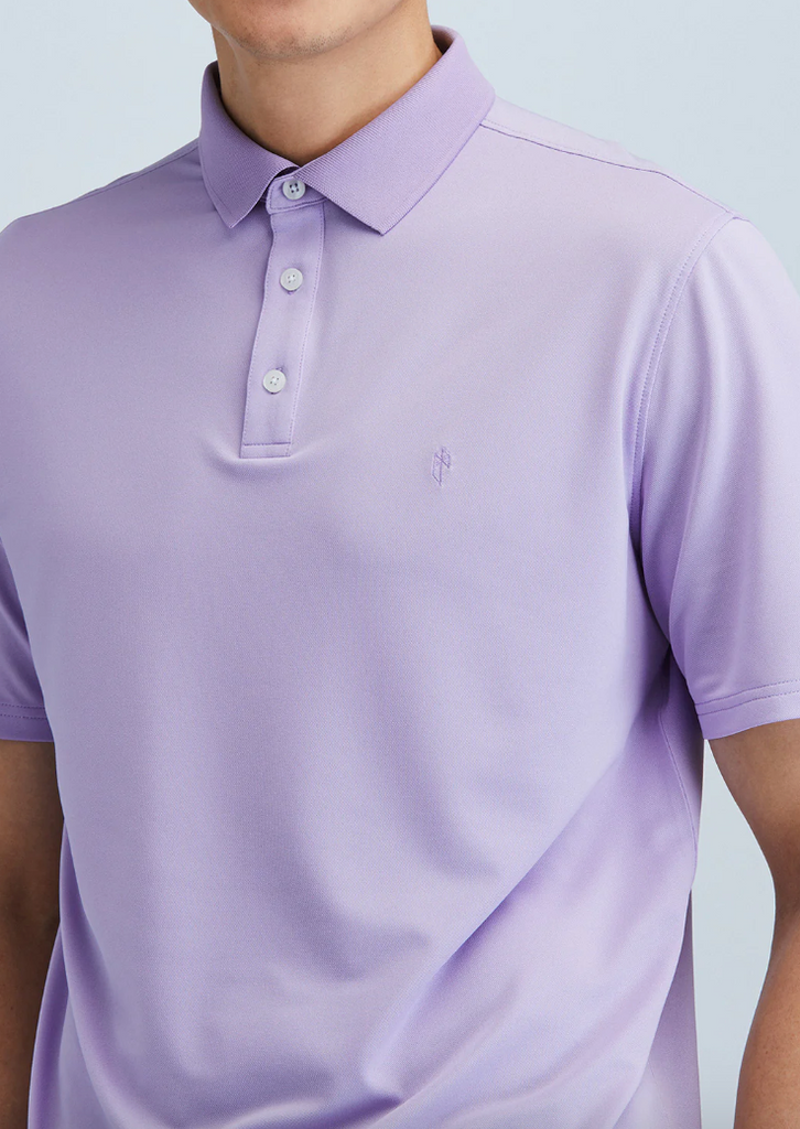 A man wearing a State of Matter Sustainable Men's Lavender Polo Shirt