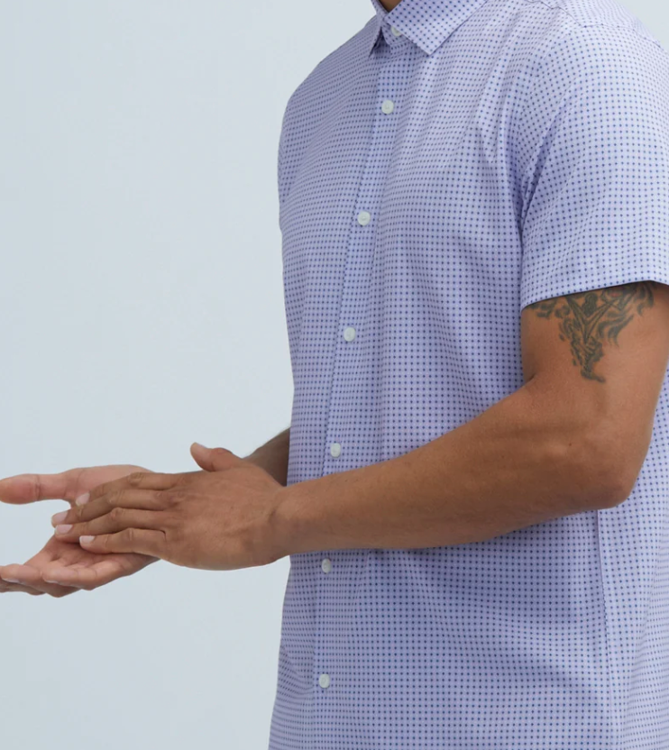 A man wearing a State of Matter Men's Lavender Floral Geo Short Sleeve Shirt