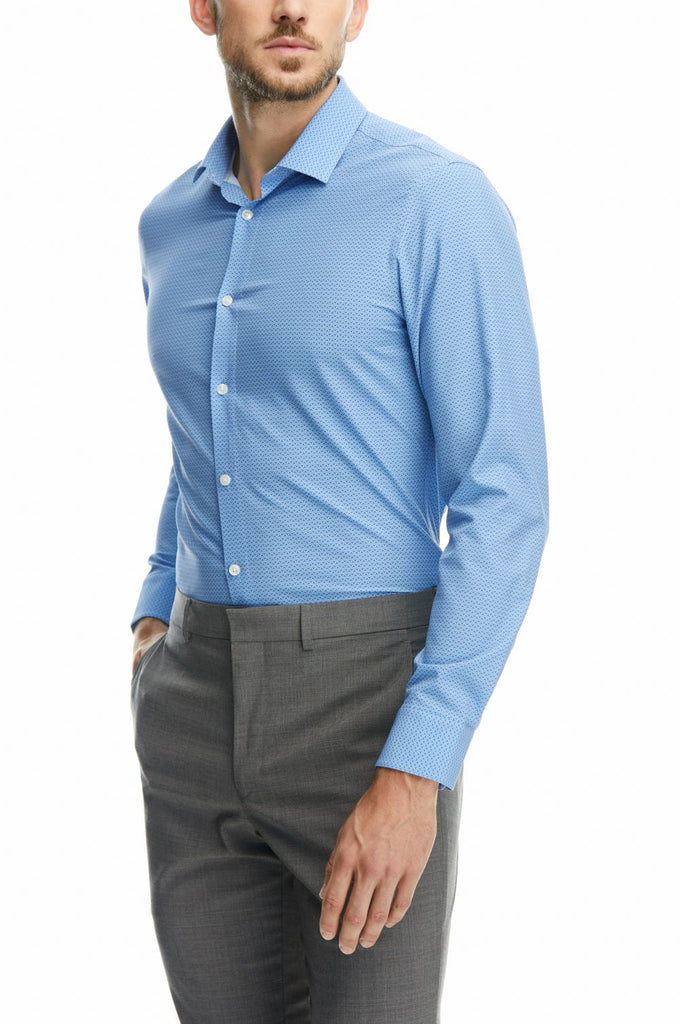 Man wearing a long sleeve blue button down shirt by state of matter
